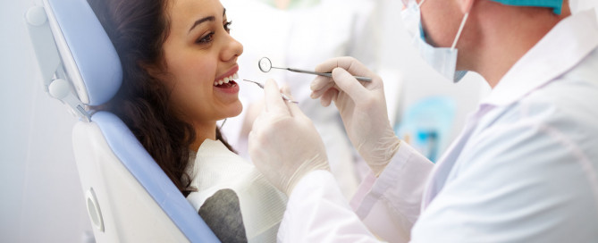 dental treatments examing teeth